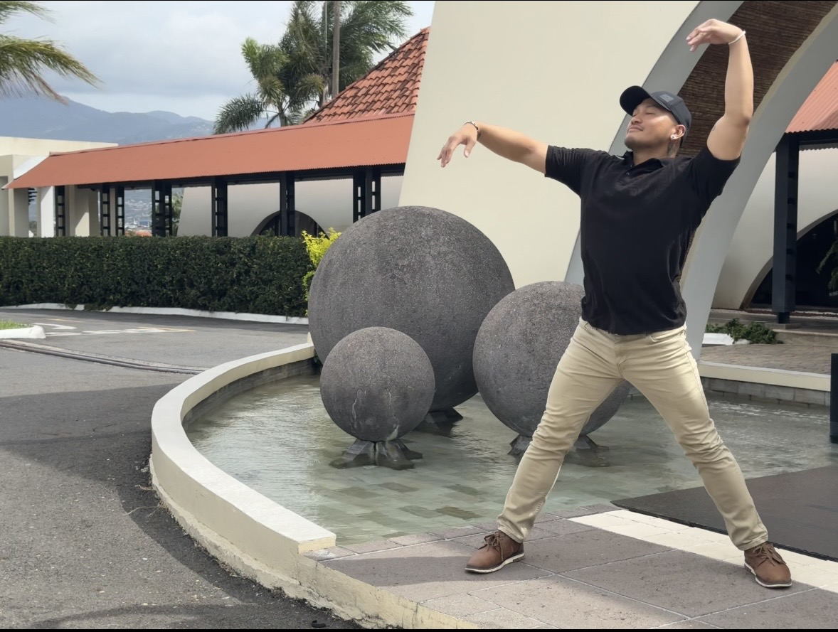 Zano in an expansive movement stance outdoors.
